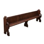A Victorian pitch pine pew. 245 cm x 80 cm. Postage not available.