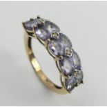 9ct gold tanzanite and diamond ring, 2.9 grams. Size N, 6.1 mm. UK Postage £12.