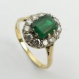 18ct gold emerald and diamond ring, 5.4 grams. Size T 1/2, 14.6 mm. UK Postage £12.