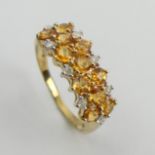 9ct gold yellow sapphire and diamond ring, 2.2 grams. Size N 1/2, 7.2 mm. UK Postage £12.