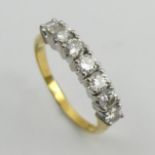 18ct gold seven stone diamond ring, 4.4 grams. Size S 1/2, 4 mm wide. UK Postage £12.