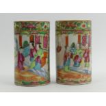 A pair of Chinese Canton porcelain famille rose palette brush pots, 19th century. 11 x 6.5 cm. UK