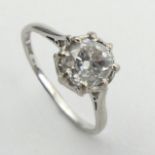 18ct gold and platinum solitaire diamond ring approx 1.5cts, 3 grams. Size Q 1/2, 9.5 mm. UK Postage