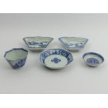 Four Chinese blue and white porcelain dishes and a tea bowl. Tea bowl 4.5 cm high. UK Postage £14.