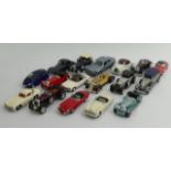 Seventeen Corgi, Dinky and other die cast model cars. Largest 13 cm. UK Postage £15.