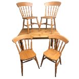 A pine farmhouse pine table and four matching kitchen chairs. Table 122 x 75 cm. Postage not