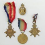 Two World War I medals, P.T.E E. Scott Norfolk Regiment and P.T.E J. Lovell along with an On War