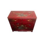 A Chinese style lacquer ware cabinet of two drawers over two cupboard doors. 91 x 45 x 80 cm.