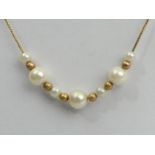 9ct gold and cultured pearl necklace, 1.7 grams. 41 cm. UK Postage £12.