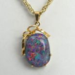 9ct gold opal doublet pendant and chain, 9.9 grams. Pendant 28 mm, chain 54 cm. UK Postage £12.