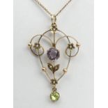 9ct gold amethyst, peridot and seed pearl Art Nouveau pendant and chain, 3.7 grams. Chain 45 cm,