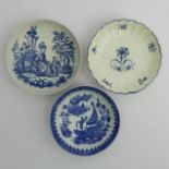 Three Worcester blue and white porcelain saucer dishes, Mother and Child, Fisherman and floral