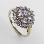 9ct gold blue tanzanite cluster ring, 2.3 grams, Size O, 14.4mm wide. UK Postage £12