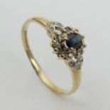 9ct gold sapphire and diamond ring, 1.7 grams. Size U, 8.8 mm wide. UK Postage £12.