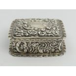 Edwardian silver repousse decorated hinged trinket box, Birm. 1902 43.7 grams. 64 x 25mm. UK Postage