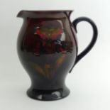 Moorcroft Art Pottery, Orchid design, flambe glaze jug, 18cm. UK Postage £15