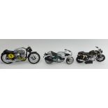 Three un-boxed Minichamps motorcycles, two Norton and a Ducati example. UK Postage £14