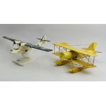 A hand made wooden sea plane and a model metal seaplane, wooden 53cm wide. Collection only.