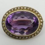 9ct gold amethyst and seed pearl brooch, 5.6 grams, 23 x 18mm. UK Postage £12.