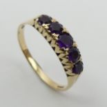 9ct gold amethyst five stone ring, 2.4 grams. Size U, 5.2 mm wide. UK Postage £12.
