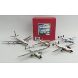 CA12A Ambassador boxed model diecast aeroplane along with four un-boxed examples, largest 23cm long.