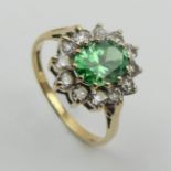 9ct gold, green and white stone cluster ring, 2.5 grams Size N 1/2, 13.7 wide. UK Postage £12.