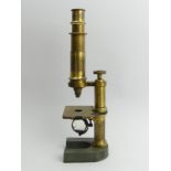 Brass Microscope by E.Hartnack et Cie, Paris along with a box of 36 slides. Circa 1870, 27cm. UK