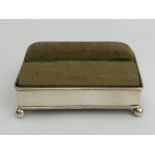 George V novelty silver pin cushion in the form of a couch, opens to reveal a silk lined interior.