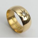 18ct gold diamond set (approx .12ct) wedding ring, Birm. 1919, 10.8 grams, Size V1/2, 9.2mm wide. UK