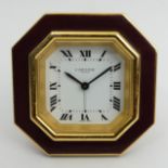 Cartier gilt and maroon travel alarm clock, 7.5cm high, UK Postage £12, Condition Report: Working