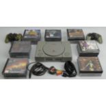 Playstation 1 console, controllers and games. UK Postage £18.