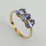 9ct gold three stone pear shape tanzanite ring, 1.6 grams, 6mm wide, Size N1/2. UK Postage £12