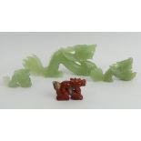 Three Chinese carved Jade dragons and a red hardstone example, largest 18cm x 7cm, UK Postage £12.