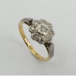 18ct gold diamond daisy design ring, 2.5 grams 9.2mm. Size I. UK Postage £12