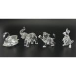 Swarovski crystal figures, a swan, kangaroo, lion cub, and elephant in original boxes, elephant 6.