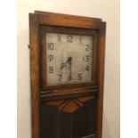 Art Deco oak cased long cased clock with pendulum and weights, 193cm x 51cm x 31cm. Collection only.