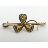 9ct gold citrine and seed pearl clover leaf design brooch, 1.7 grams, 32mm long. UK Postage £12.