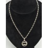 Gucci sterling silver interlocking G pendant and chain, M.I.B. 14 grams. Chain 54cm, Pendant 28mm.
