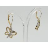 A pair of 9ct gold diamond set butterfly design drop earrings, 2.7 grams. UK Postage £12.