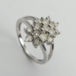 9ct white gold diamond, (approx .6ct) cluster ring, 3.8 grams, Size N1/2, 15mm wide. UK Postage £12