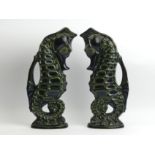 A pair of Fosters pottery green glazed seahorse jugs, 36.5cm. UK Postage £18.