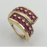 9ct gold ruby set ring, 5.6 grams, 14.7mm, Size N1/2. UK Postage £12