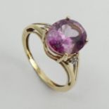 9ct gold oval pink topaz and diamond ring, 2.5 grams, 11mm wide, Size O. UK Postage £12