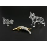 Swarovski crystal Alsatian and a Baby Alligator along with a crystal Dolphin brooch all boxed,