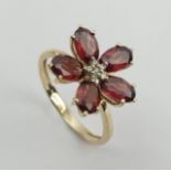 9ct gold rhodolite and diamond flower design ring, 2.6 grams, 14.5mm wide, Size N1/2 UK Postage £12