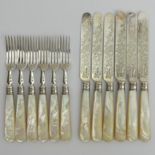 A set of six Victorian mother of pearl and silver dessert knives and forks, Sheffield 1895, 543