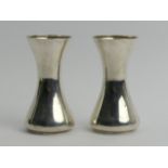 A pair of Edwardian silver vases, Birm. 1907, 101 grams, 10.6cm. UK Postage £12.