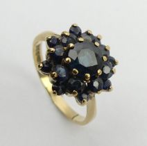 9ct gold sapphire cluster ring, Birm. 1980, 3.4 grams, 14mm, size Q. UK postage £12