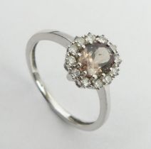 9ct white gold tourmaline and diamond ring, 2.1 grams, 10.2mm, size N1/2. UK Postage £12.