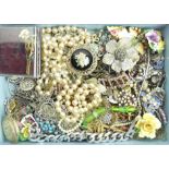 A box of mixed costume jewellery including some silver. UK Postage £12